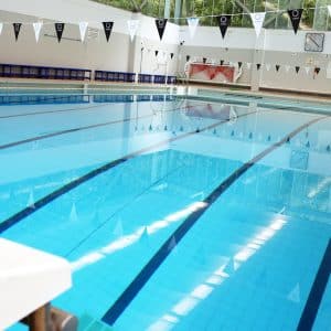 Swimming Pool with school bunting across the pool site