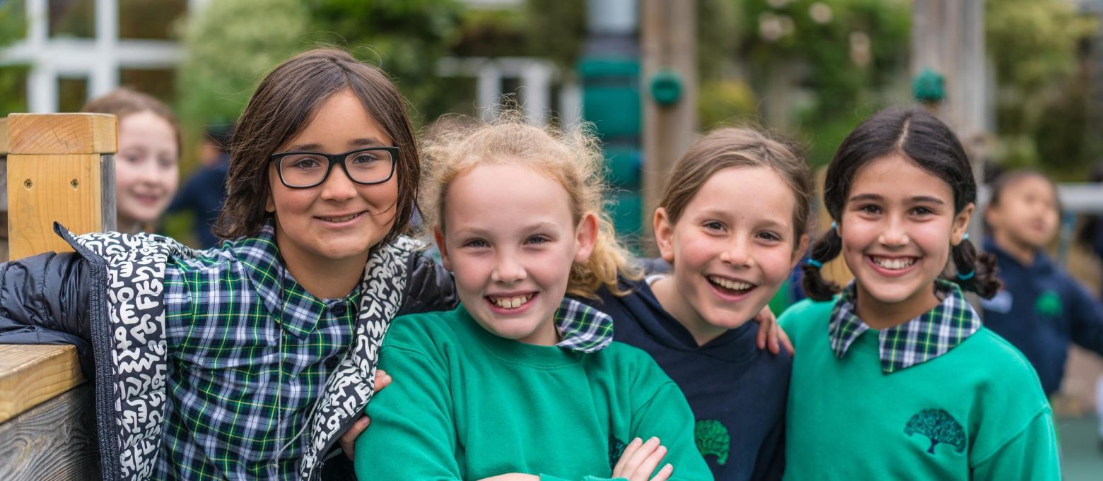 girls standing for a photo