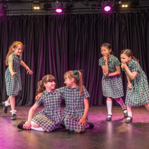 girls in a theatre performance