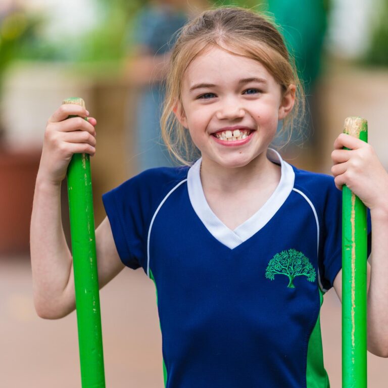 girl holding up stilts