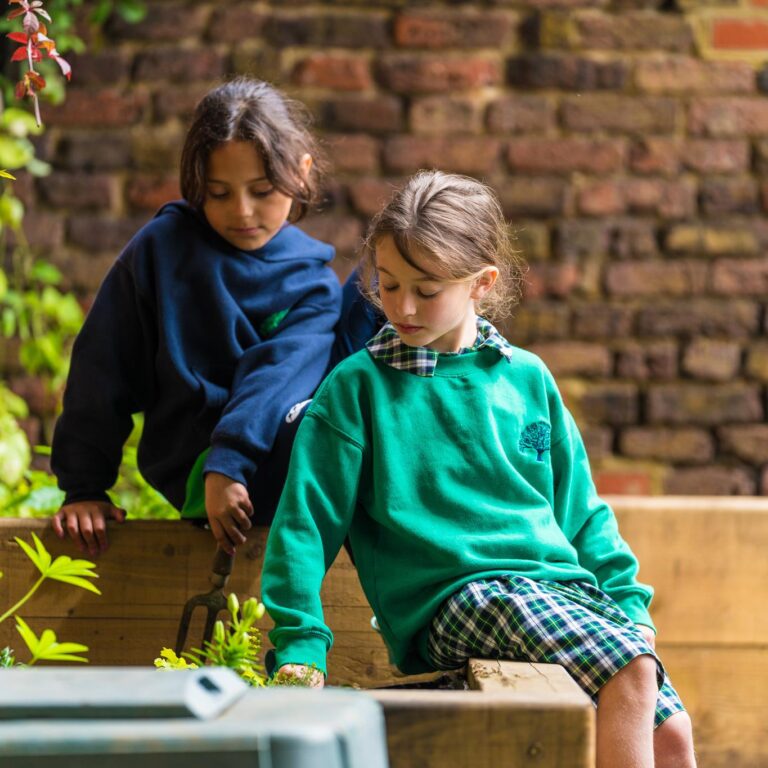 students in water play