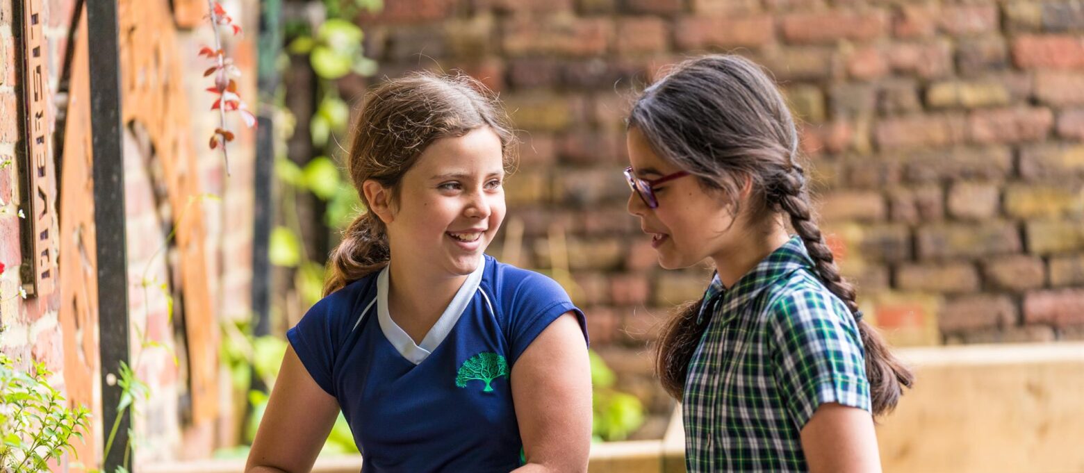 2 girls enjoying the garden