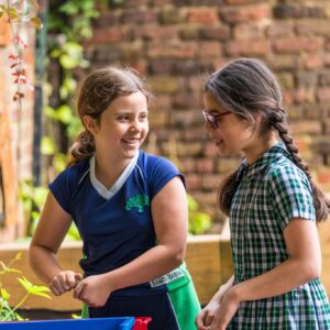 2 girls enjoying the garden